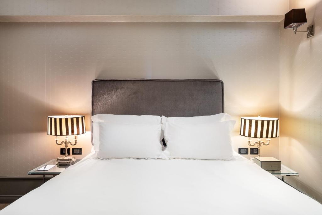 Postel nebo postele na pokoji v ubytování Hotel B Berdichevsky