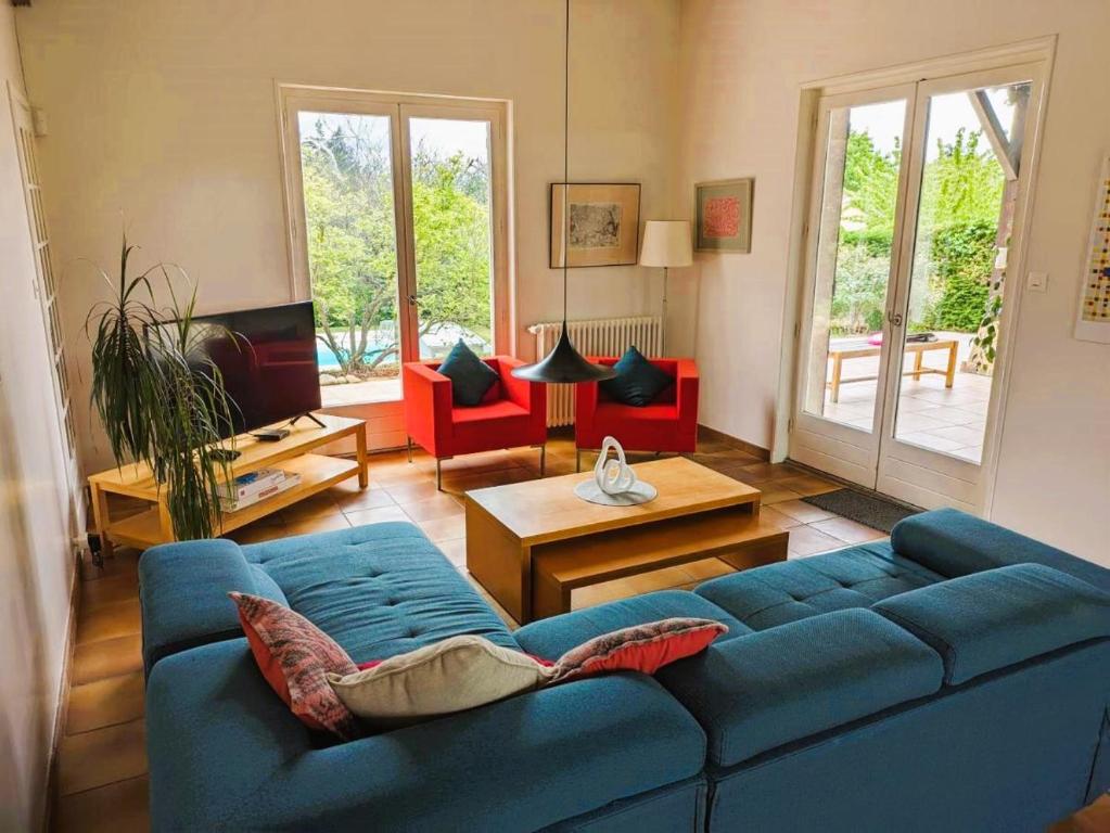 Posezení v ubytování Villa avec piscine et vue panoramique