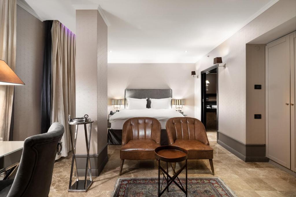 Postel nebo postele na pokoji v ubytování Hotel B Berdichevsky