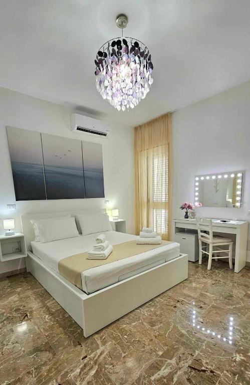Postel nebo postele na pokoji v ubytování Albatros B&B Porto Cesareo