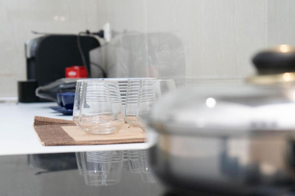 Kuchyň nebo kuchyňský kout v ubytování Berti hotel