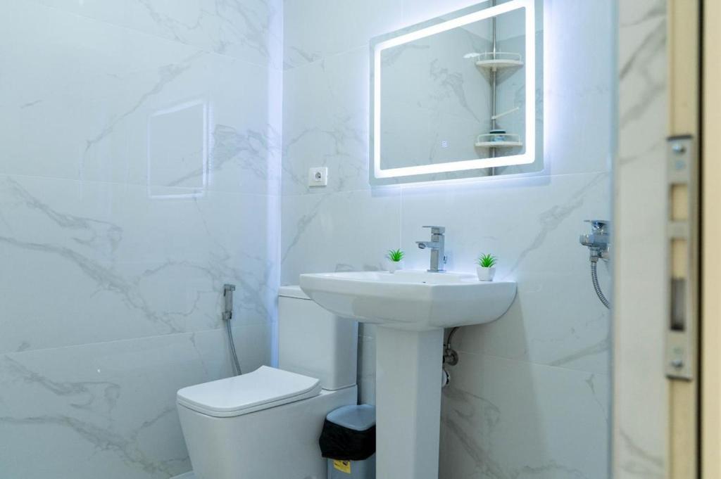 Koupelna v ubytování Berti hotel