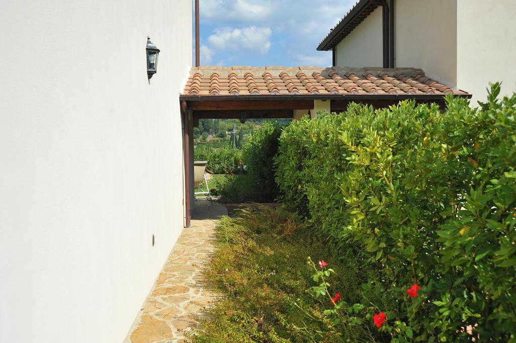 Vonkajšia záhrada v ubytovaní Residenza Le Grillaie