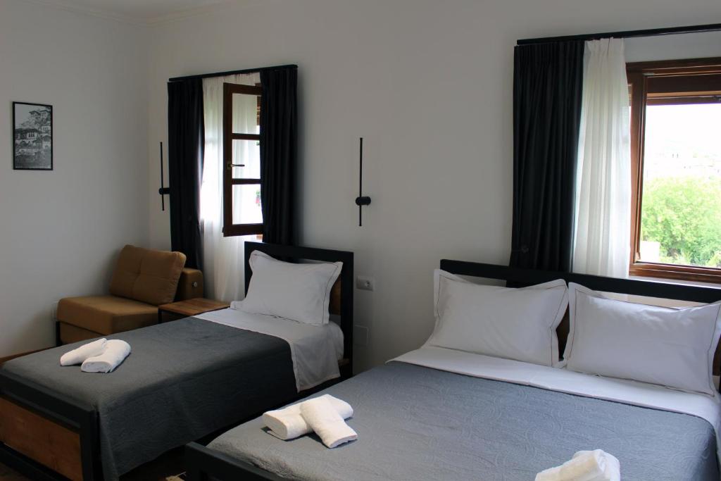 Postel nebo postele na pokoji v ubytování Guest House AmaDes