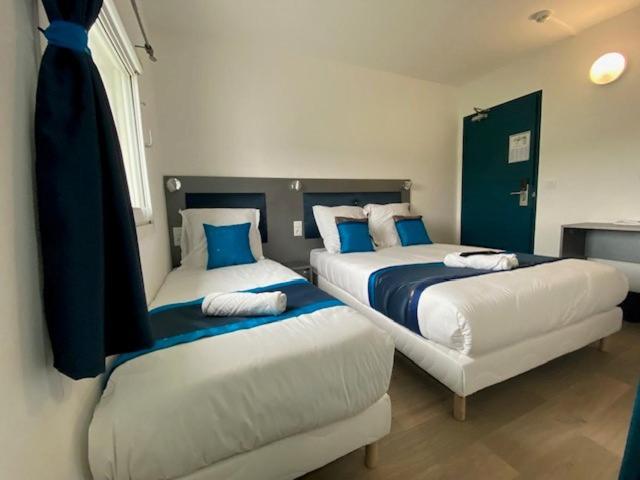 Postel nebo postele na pokoji v ubytování Fasthotel - Soissons Nord