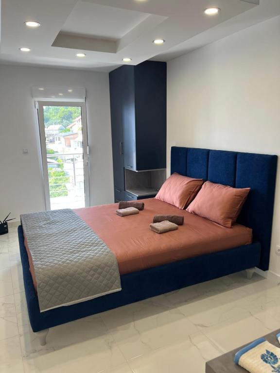 Llit o llits en una habitació de Vip apartmani
