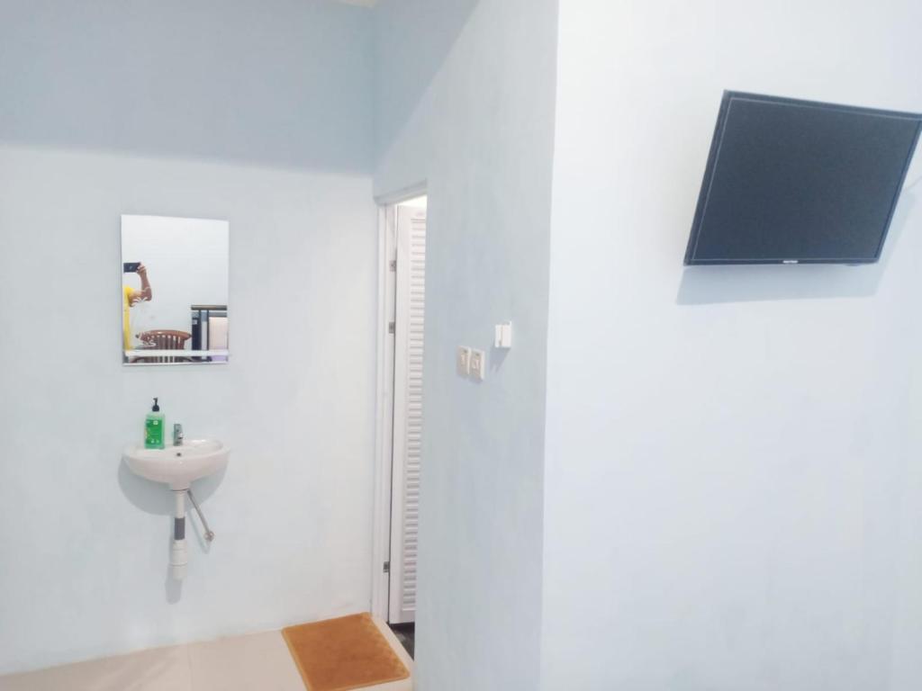 TV a/nebo společenská místnost v ubytování Sritanjung Homestay
