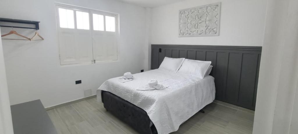 Postel nebo postele na pokoji v ubytování Aparta hotel natural
