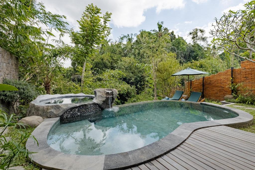 Bazén v ubytování Agastya Ubud Villa nebo v jeho okolí