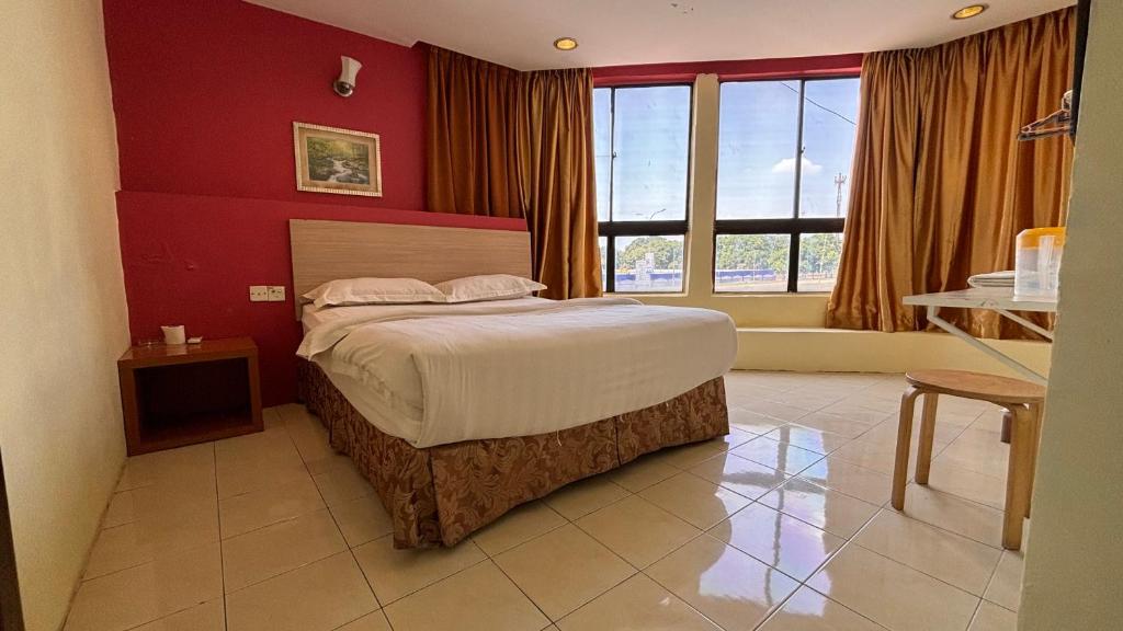 Postel nebo postele na pokoji v ubytování Hotel Centum