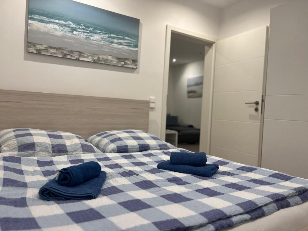 Posteľ alebo postele v izbe v ubytovaní Sinisa Apartman Vir