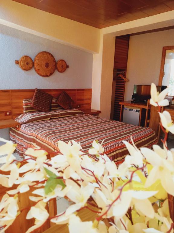 Postel nebo postele na pokoji v ubytování CITI HOTEL