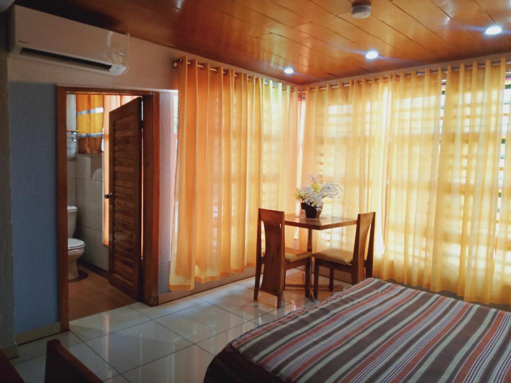 Postel nebo postele na pokoji v ubytování CITI HOTEL