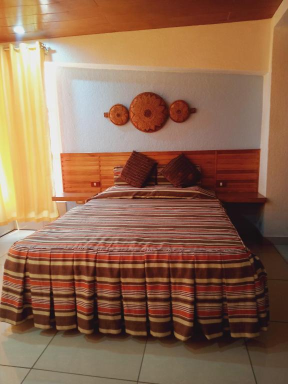 Postel nebo postele na pokoji v ubytování CITI HOTEL