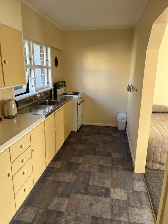 Kuchyň nebo kuchyňský kout v ubytování Classic Motel