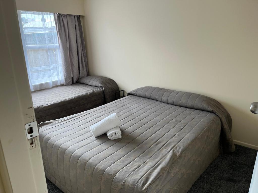 Postel nebo postele na pokoji v ubytování Classic Motel