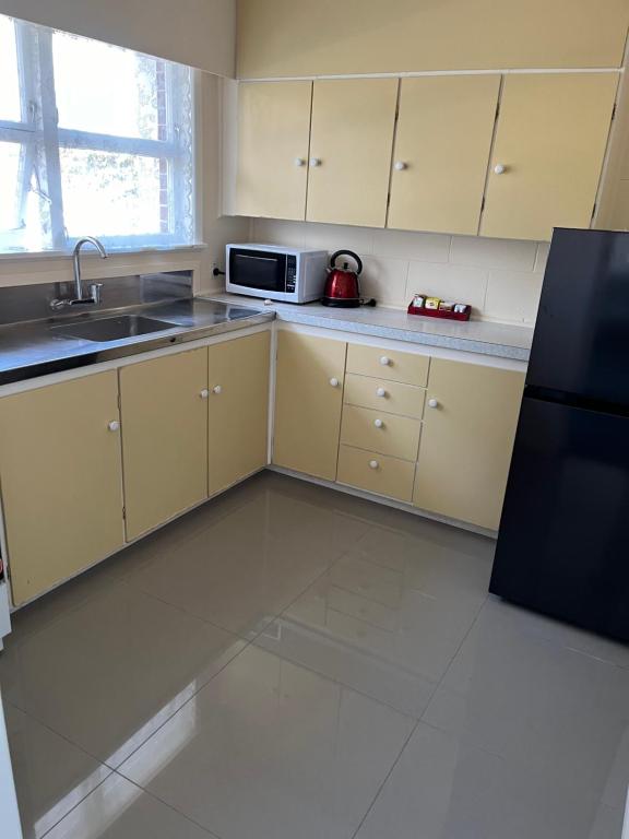 Kuchyň nebo kuchyňský kout v ubytování Classic Motel