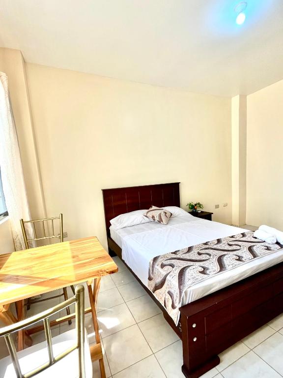 Postel nebo postele na pokoji v ubytování HOTEL SUEÑOS BEACH