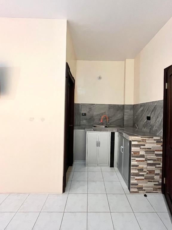 Kuchyň nebo kuchyňský kout v ubytování HOTEL SUEÑOS BEACH