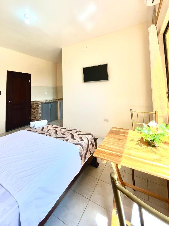 Postel nebo postele na pokoji v ubytování HOTEL SUEÑOS BEACH