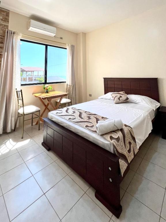 Postel nebo postele na pokoji v ubytování HOTEL SUEÑOS BEACH