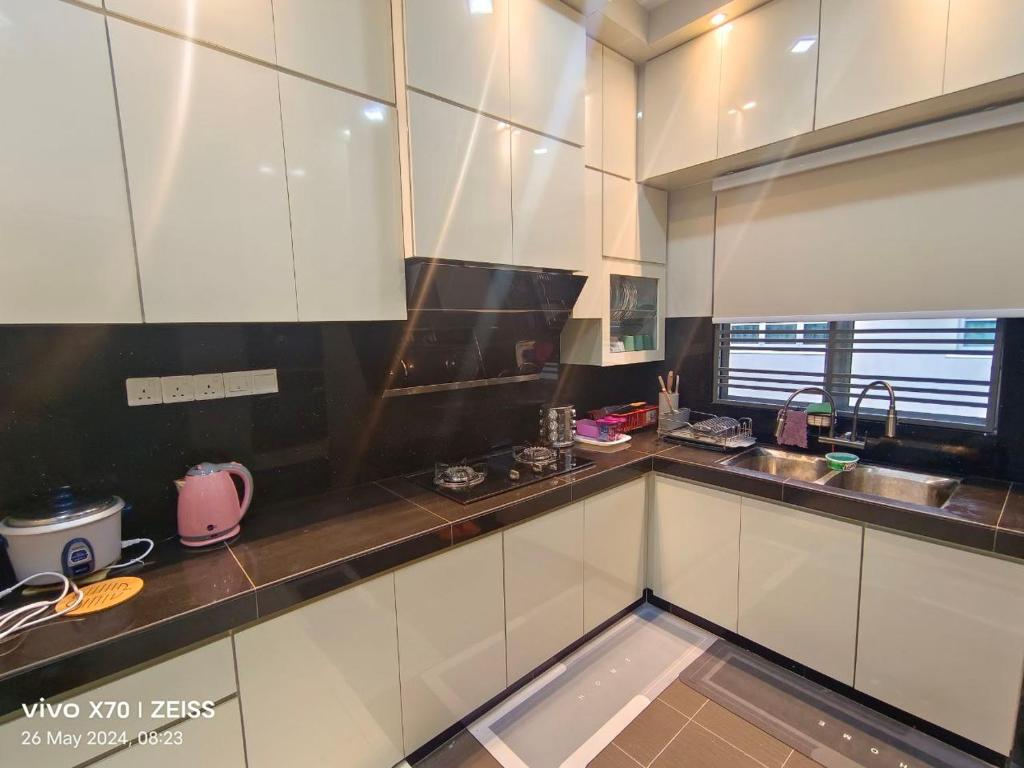 Kuchyň nebo kuchyňský kout v ubytování HANS HOMESTAY
