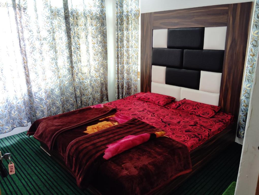 Postel nebo postele na pokoji v ubytování Moonlight Homestay
