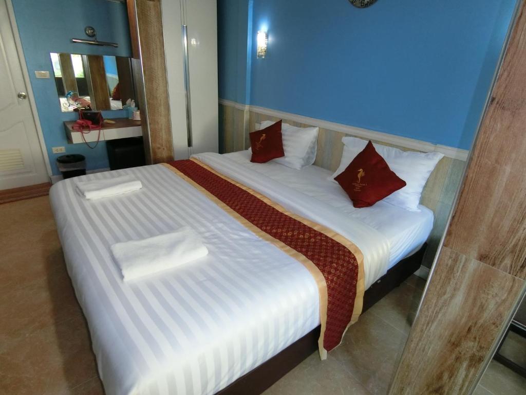 Postel nebo postele na pokoji v ubytování Searide hotel