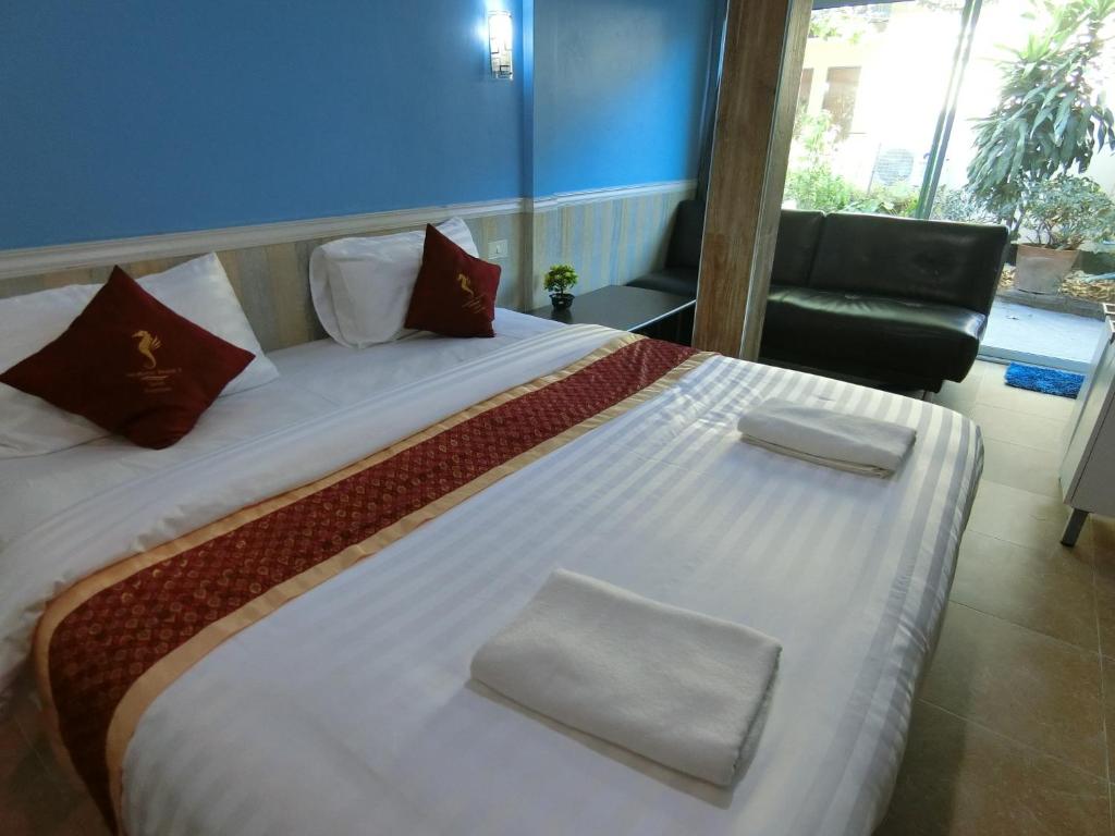 Postel nebo postele na pokoji v ubytování Searide hotel