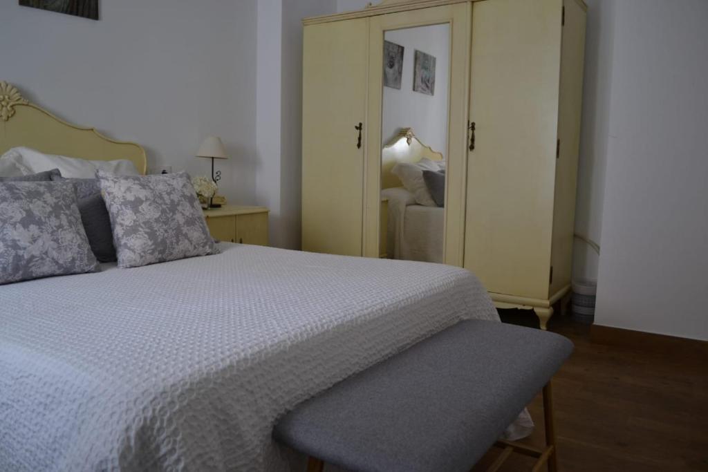 Postel nebo postele na pokoji v ubytování Casa Isabel