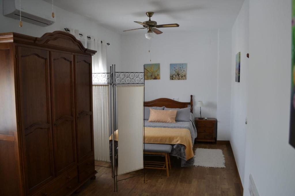 Postel nebo postele na pokoji v ubytování Casa Isabel