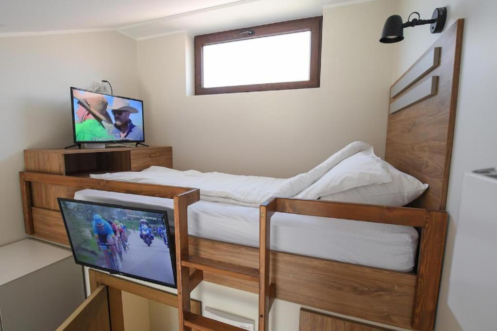 Postel nebo postele na pokoji v ubytování Atrijum Apartments and Rooms