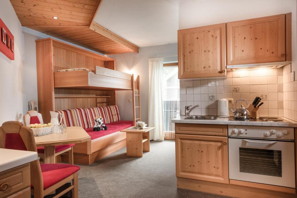 Kuchyň nebo kuchyňský kout v ubytování Gästehaus Gratz - inklusive Eintritt in die Alpentherme