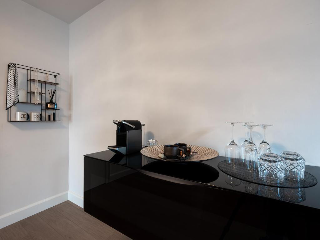 Příslušenství pro přípravu čaje a kávy v ubytování Maison Idyllique