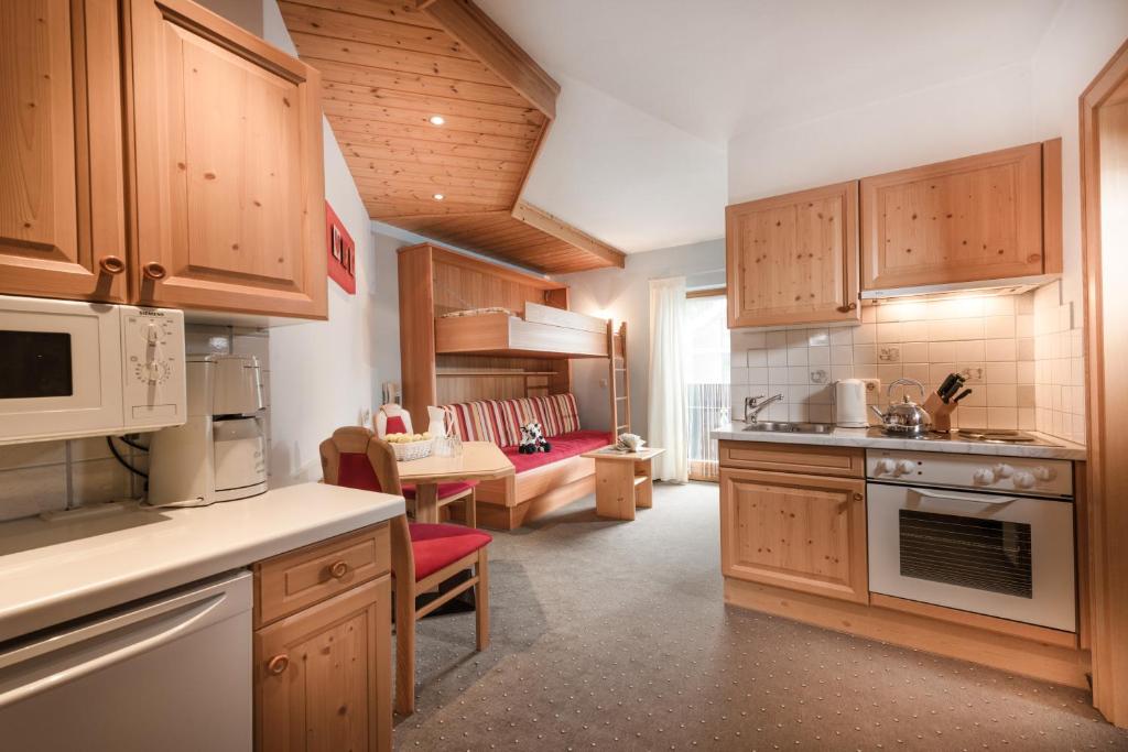 Kuchyň nebo kuchyňský kout v ubytování Gästehaus Gratz - inklusive Eintritt in die Alpentherme