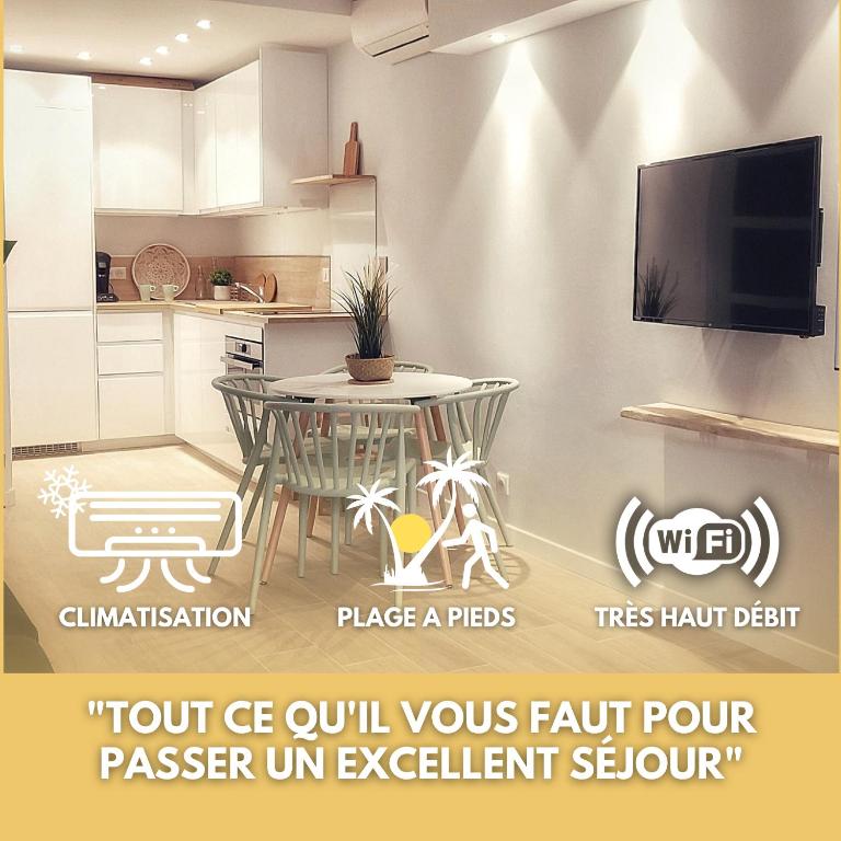 une cuisine avec une table et une salle à manger dans l'établissement Plage à 3 minutes à pied, à Saint-Raphaël