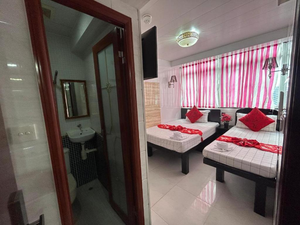 Postel nebo postele na pokoji v ubytování Rhine Guest House