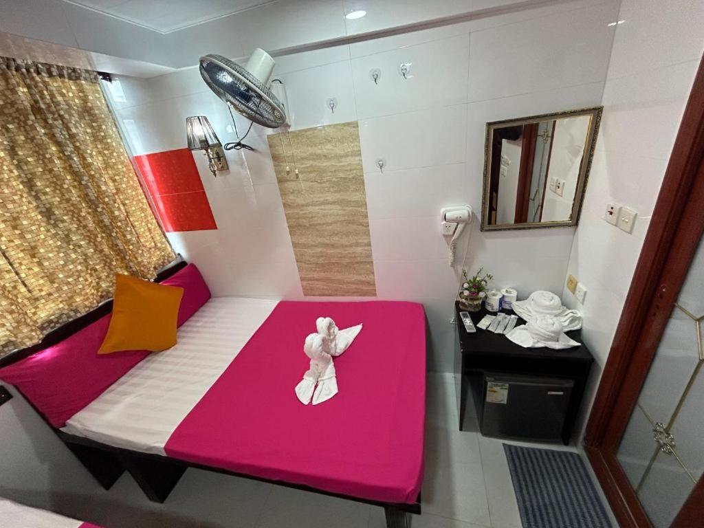 Postel nebo postele na pokoji v ubytování Rhine Guest House
