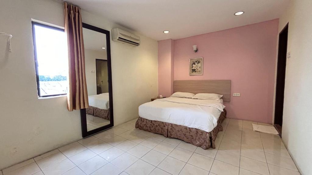 Postel nebo postele na pokoji v ubytování Hotel Centum
