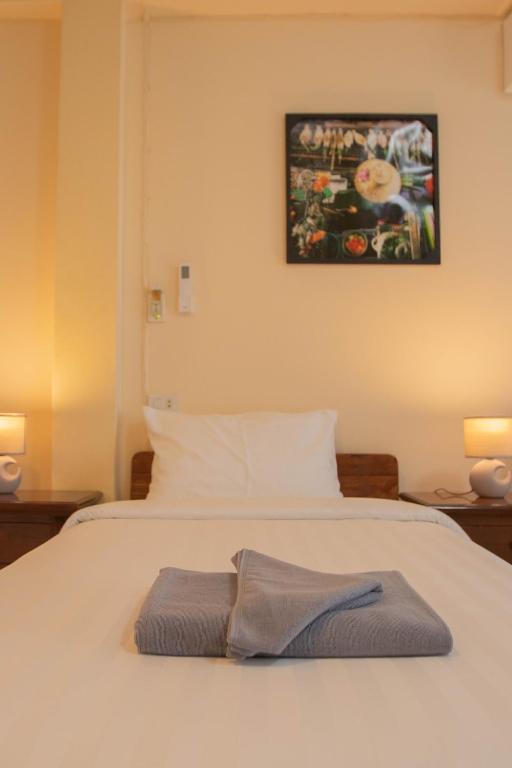 Postel nebo postele na pokoji v ubytování Maiiam Guesthouse Patong