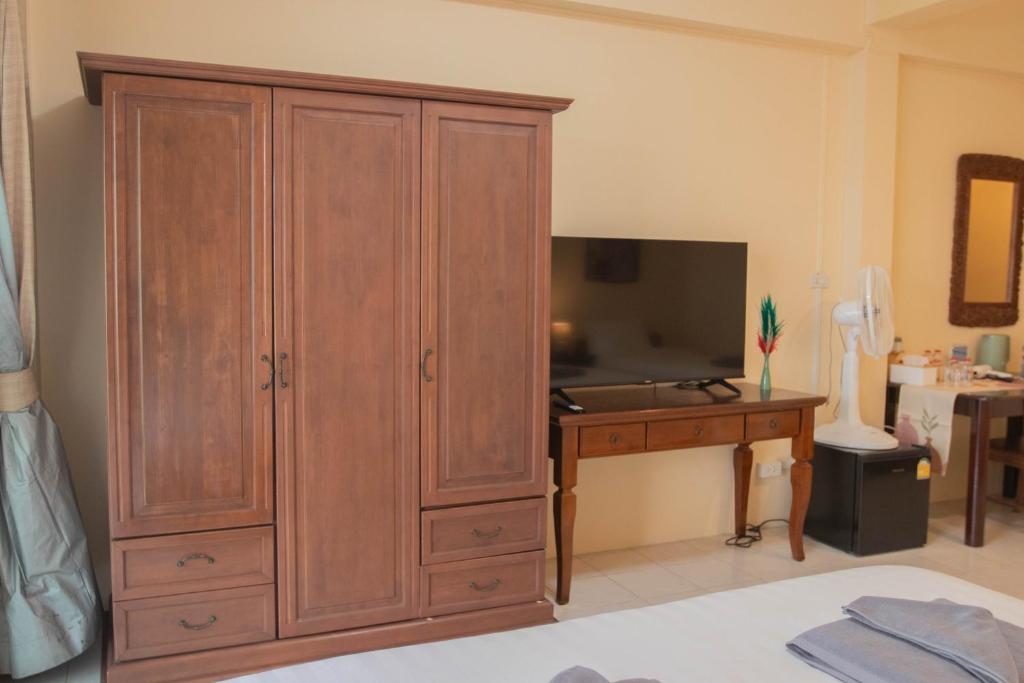 TV a/nebo společenská místnost v ubytování Maiiam Guesthouse Patong
