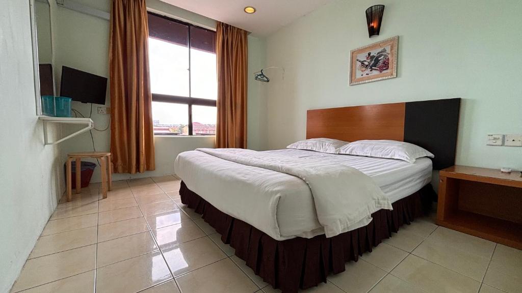 Postel nebo postele na pokoji v ubytování Hotel Centum