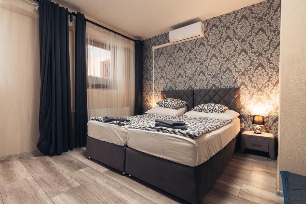 Posteľ alebo postele v izbe v ubytovaní Végvári Hotel Eger