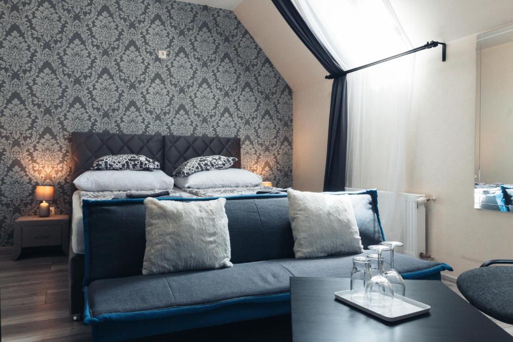 Posteľ alebo postele v izbe v ubytovaní Végvári Hotel Eger