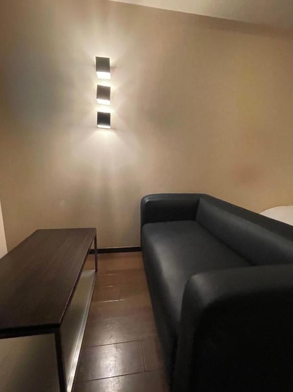 Posezení v ubytování Hotel BIX チェックイン23時 変更不可