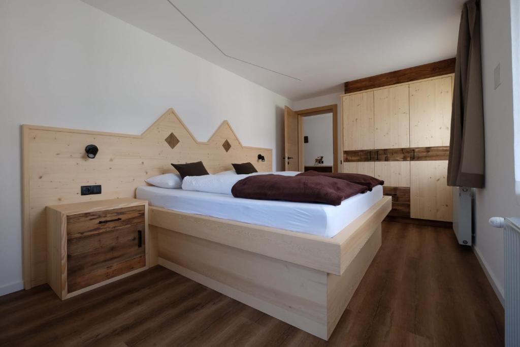 A bed or beds in a room at Gasserhof