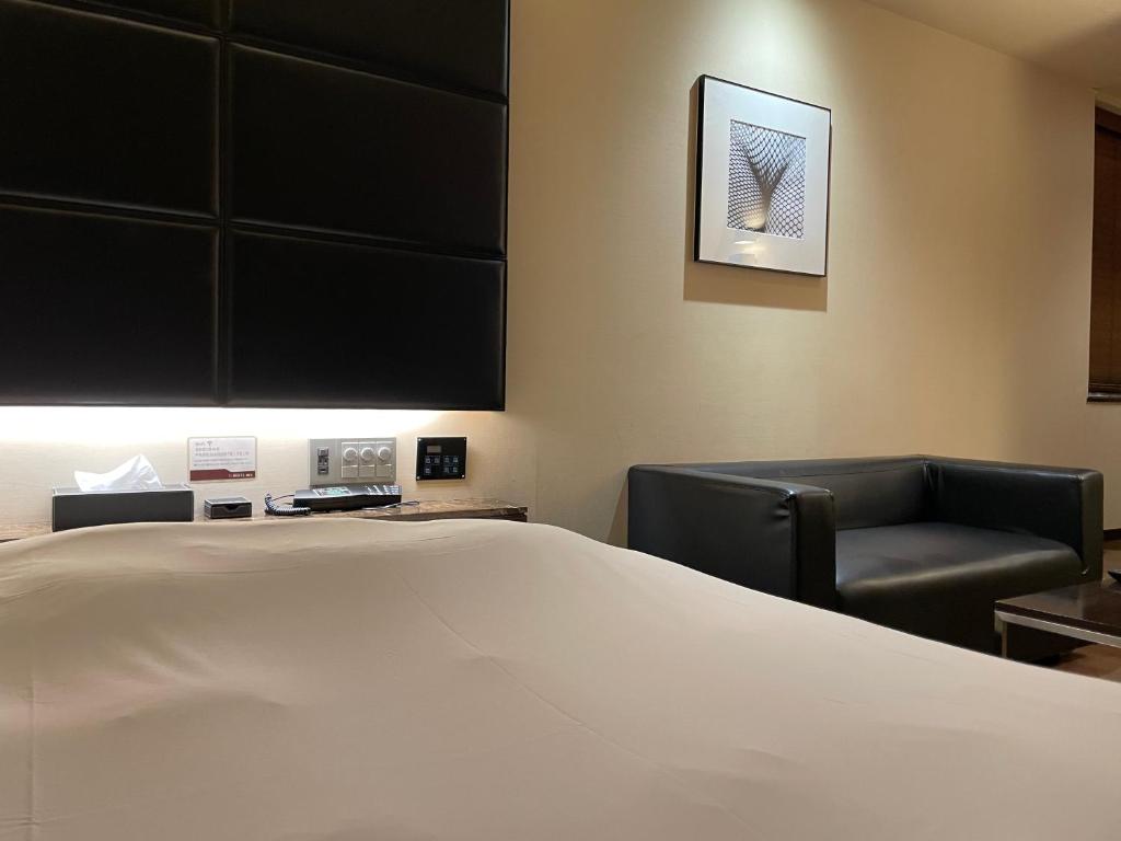 Postel nebo postele na pokoji v ubytování Hotel BIX チェックイン23時 変更不可