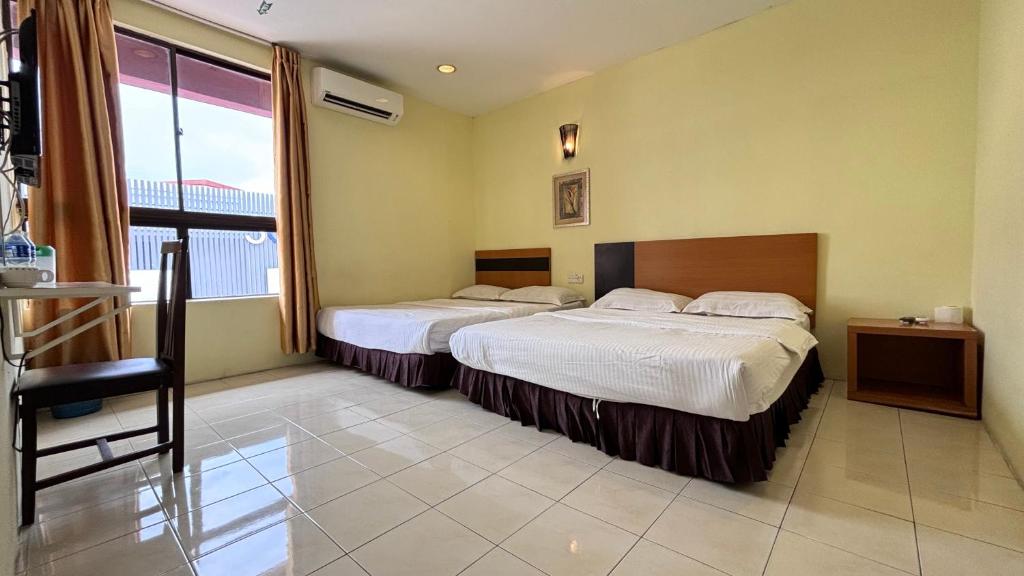Postel nebo postele na pokoji v ubytování Hotel Centum