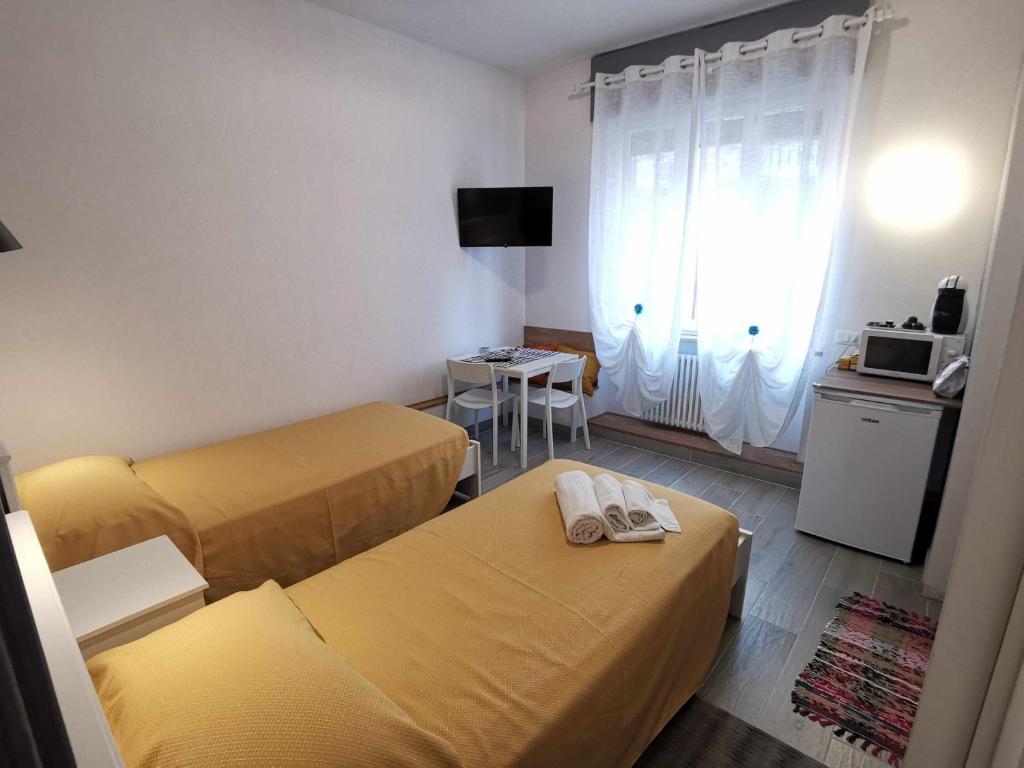 Casa Belfiore Vicenza Medici 23 tesisinde bir odada yatak veya yataklar