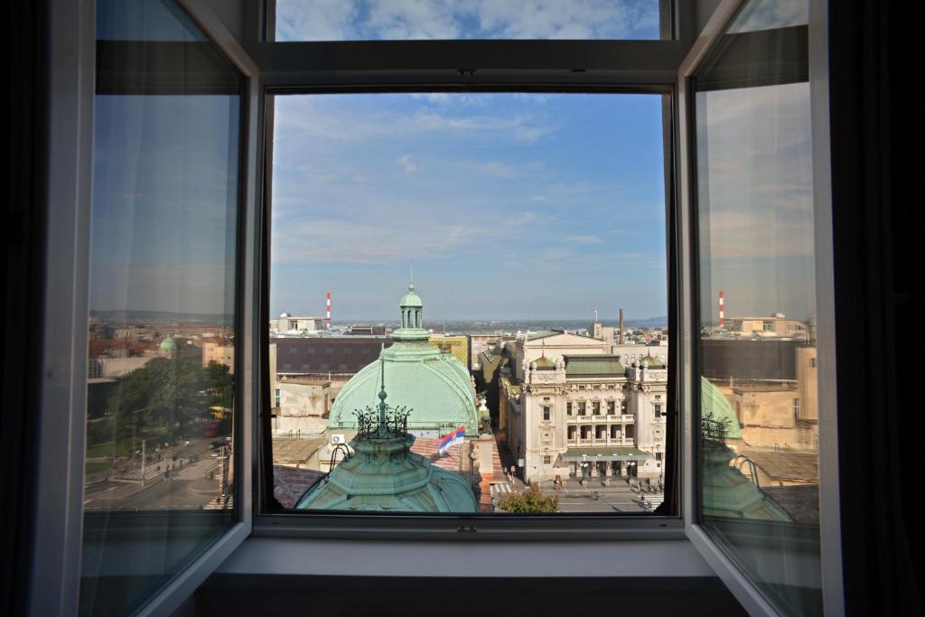 a view of a building from a window at Five Points Square - City Center in Belgrade